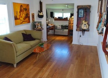 Inside of Cottage 3, Tumbleweed Guitar International Headquarters showroom. Riverside Park, Bonita 