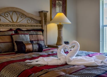 swan towels on bed in Florida Villa