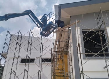 Suasana Renovations exterior building construction, scaffolding, and commercial work.