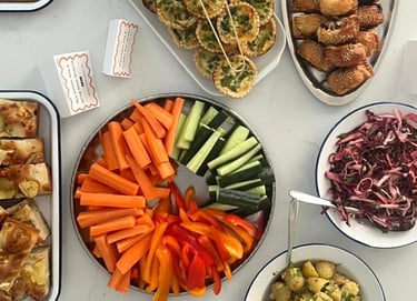 a table with a variety of buffet items