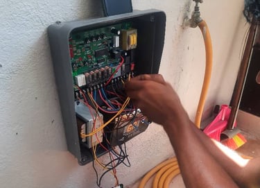 Suasana Electrical installing circuit breakers, wiring, and DB box safety.