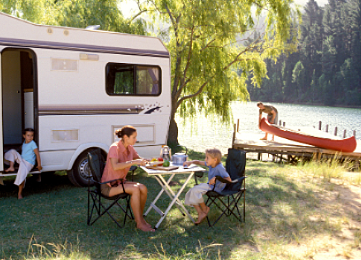 family camping by lake