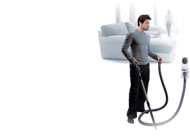 Homme qui passe l'aspirateur Duovac