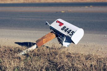 Damaged mailbox and post