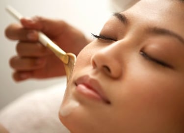woman getting facial treatment