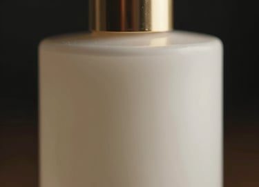 A macro shot of a high-end luxury product, such as a designer perfume bottle, with dramatic cinematic lighting. The background is deep black, highlighting the soft off-white glass and muted gold metallic accents.