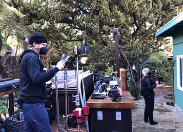 Camera crew shooting video at Talbotics workshop.