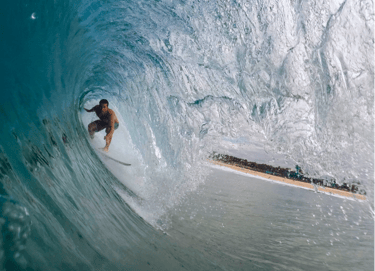 a surfer is riding a wave in the ocean