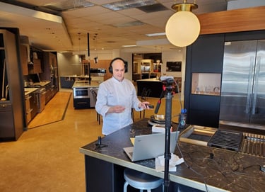 Chef Andrew recording a podcast in a showroom.