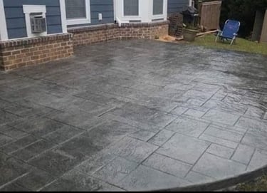 a patio with a patio with a concrete patio with a concrete patio with a concrete
