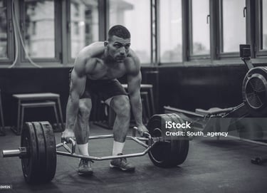 a man holding an exercise bar
