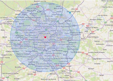 Carte montrant une zone de couverture autour de Paris avec un point central en rouge et un cercle bleu indiquant un rayon d’i