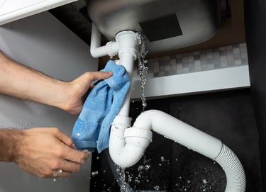 Suasana Plumbing services fixing basin u-trap leak with adjustable wrench