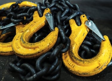 chain slings laid out ready for inspection