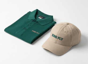 King Fly Corporate Apparel: Deep Emerald Green Polo Shirt and Custom Beige Cap.