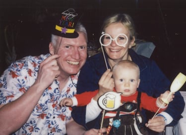 Happy family celebrating their first New Year's Eve