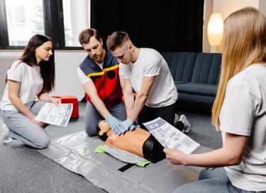a group of people learning CPR and medical skills