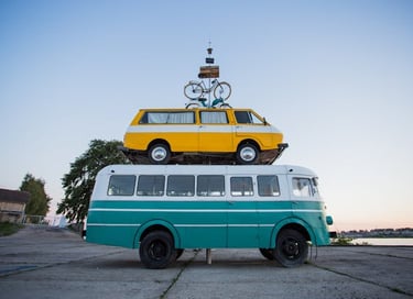 a bus with a bicycle on top of it