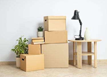 Packed boxes and decor — downsizing and transitions support by simplelilac