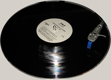 John Rinaldo & Sons LP on turntable.