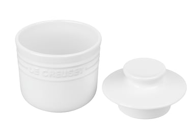 White Le Creuset stoneware butter crock with lid, embossed with brand name
