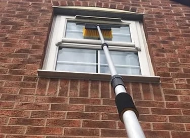 window being professionally cleaned in Malvern
