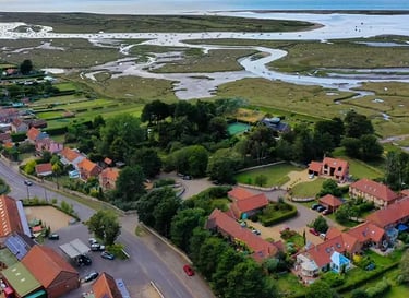 Brancaster Staithe village and marsh airial view