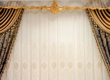 Elegant luxury gold and blue damask curtains with white lace sheers and ornate window valance decor.