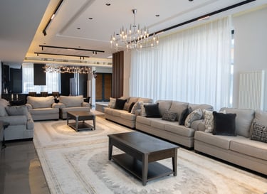 Modern majlis featuring grey sectional sofas