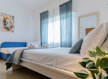 Casa Rava Sul Parco Camera da letto