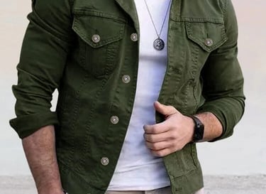 a man in a green army jean jacket and white shirt
