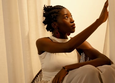 A focused gaze from a sun-kissed poet, spotlighting one of the best spoken word artists in Nigeria