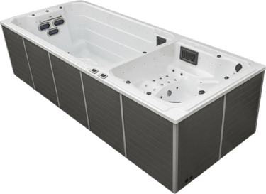 a hot tub with a large white tub and a black background