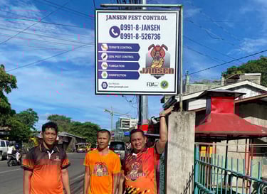 Dumaguete Pest Control staff standing outside their office at 23 Romero Road, Dumaguete City