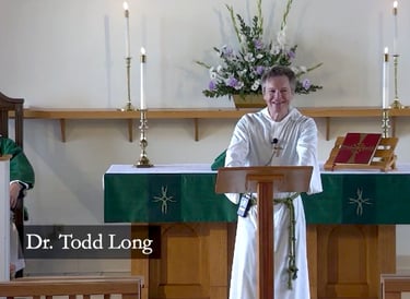 Image of Dr. Todd Long delivering homily