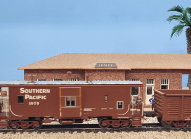Southern Pacific Caboose stopped at Tempe station