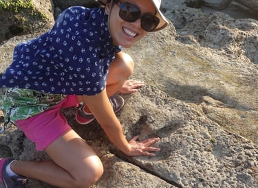 Janet finding a dinosaur track