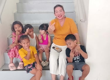 Captain Ronela-Domopoy Juaneza, with children