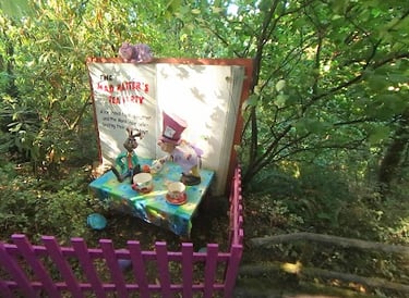 Salem, OR - Enchanted Forest with fairytale scenes on the wooded paths like Mad Hatter's tea party