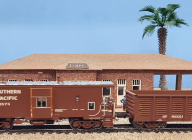Southern Pacific Caboose stopped at Tempe station
