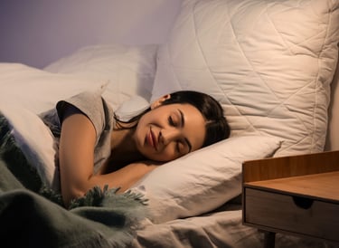 Woman sleeping peacefully during a calm night routine for better sleep and less stress