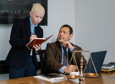 An assistant taking orders from her Boss