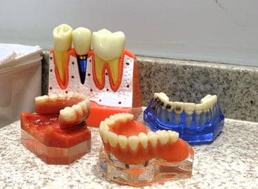 a toothbrush and dental care products on a counter