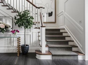 a staircase way with a vase of flowers in a vase