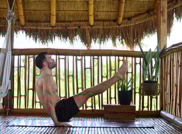V-Sit on Yoga Mat in Nipa Hut