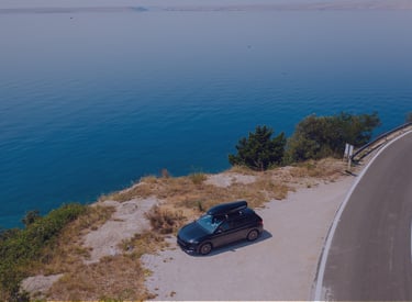 Algarve coastal road with private transfer vehicle