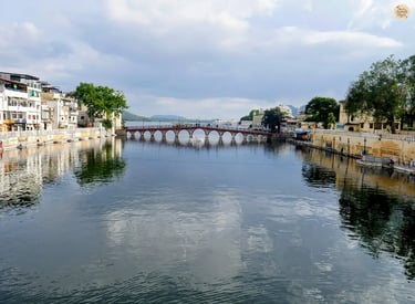 Scenic view of a historic bridge over Lake Pichhola Udaipur Rajasthan India.