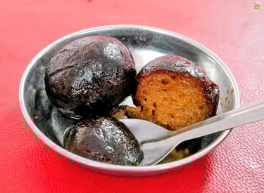 Close-up of delicious Hathijam, a traditional sweet, at Kota Dussehra Mela.