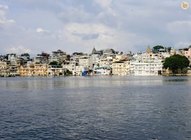 Traditional Udaipur havelis and temples lining the banks of Lake Pichhola, viewed from Ambrai Ghat Udaipur.