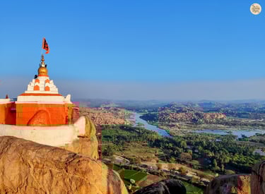 Lord Hanuman Temple on Anjanadri - overlooking Tungabhadra's flow through Hampi's boulders.